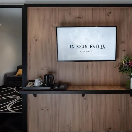 Unique Pearl Отель